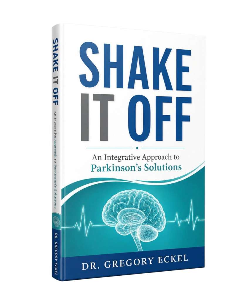 A book titled "Shake It Off: An Integrative Approach to Parkinson's Solutions" by Dr. Gregory Eckel. The cover features a brain illustration and a stylized heartbeat line on a white and teal background.